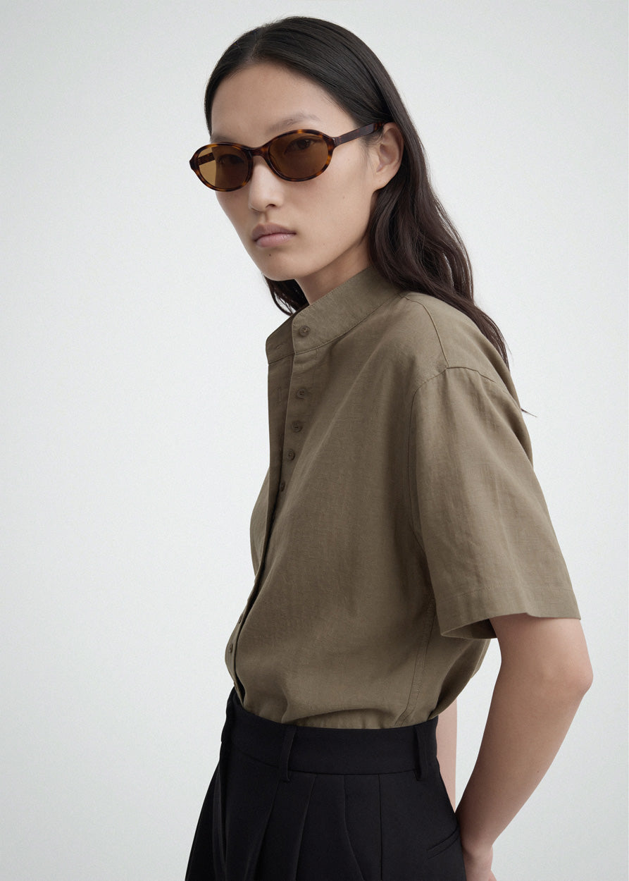 A model wearing Bibi Havana sunglasses by DMY Studios.