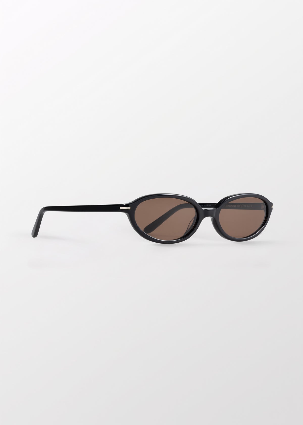 Noor Black Sunglasses by DMY Studios with brown tinted lenses.